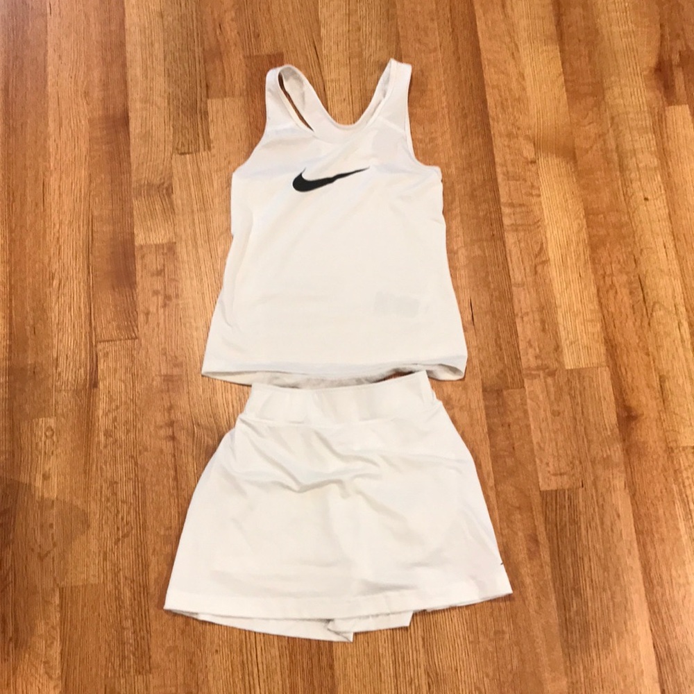 Child size tennis whites. Nike razorback top and skirt